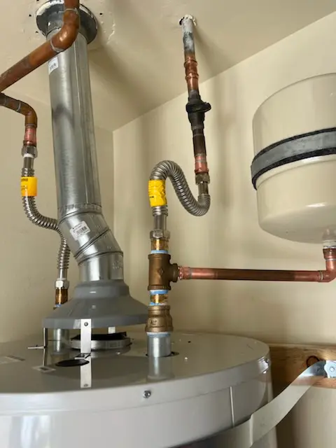Water heater installation and plumbing repair in Rogers